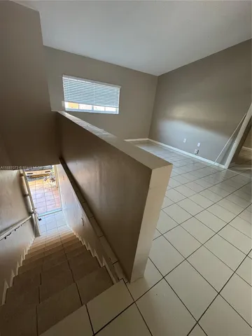 a view of an empty room with window