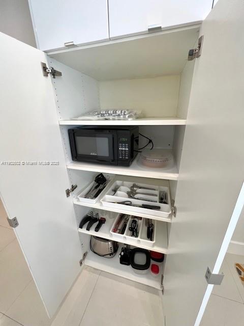 1125 99th Street, Unit 12 Bay Harbor Islands, FL 33154 - Photo 32 of 62 a close view of cabinet