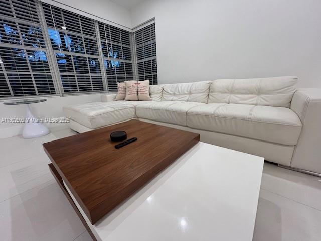 1125 99th Street, Unit 12 Bay Harbor Islands, FL 33154 - Photo 44 of 62 a living room with furniture