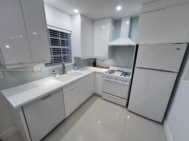 1125 99th Street, Unit 12 Bay Harbor Islands, FL 33154 - Photo 48 of 62 a kitchen with a sink a stove a refrigerator and a sink