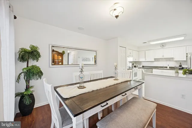 a room with furniture pool table and chair