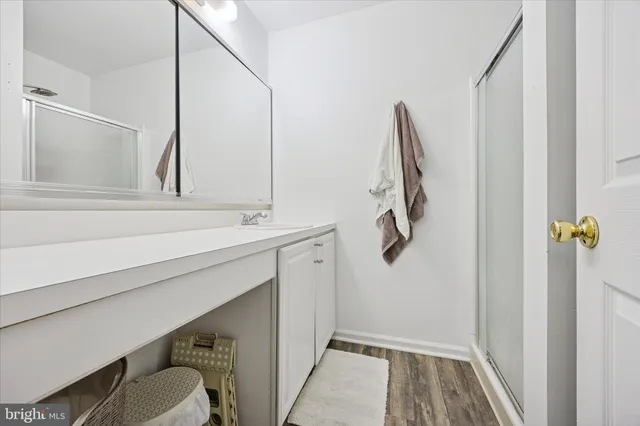 a bathroom with a sink and mirror