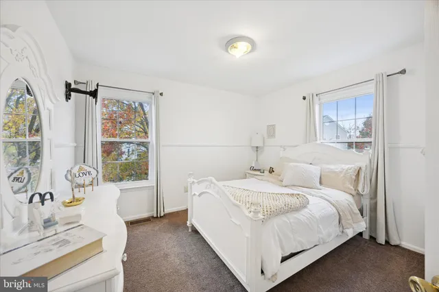 a bed room with a bed and a couch