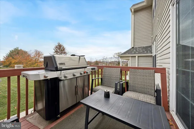 a view of a balcony with chairs