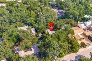 a view of a house with a tree