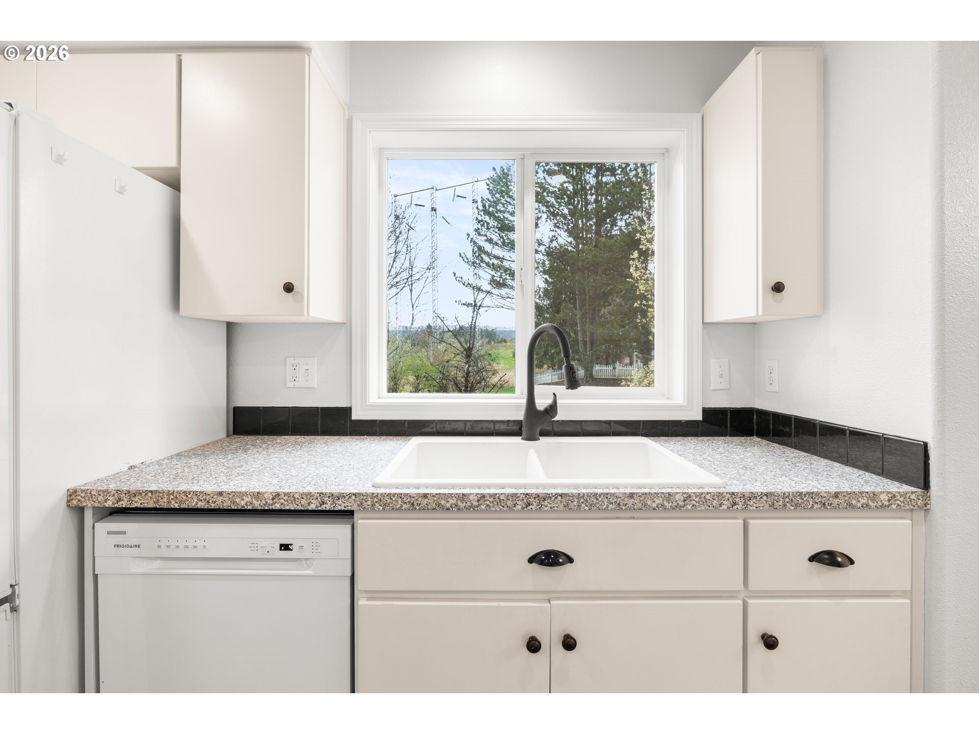5572 Northwest 165th Place Portland, OR 97229 - Photo 14 of 48 a view of window cabinets