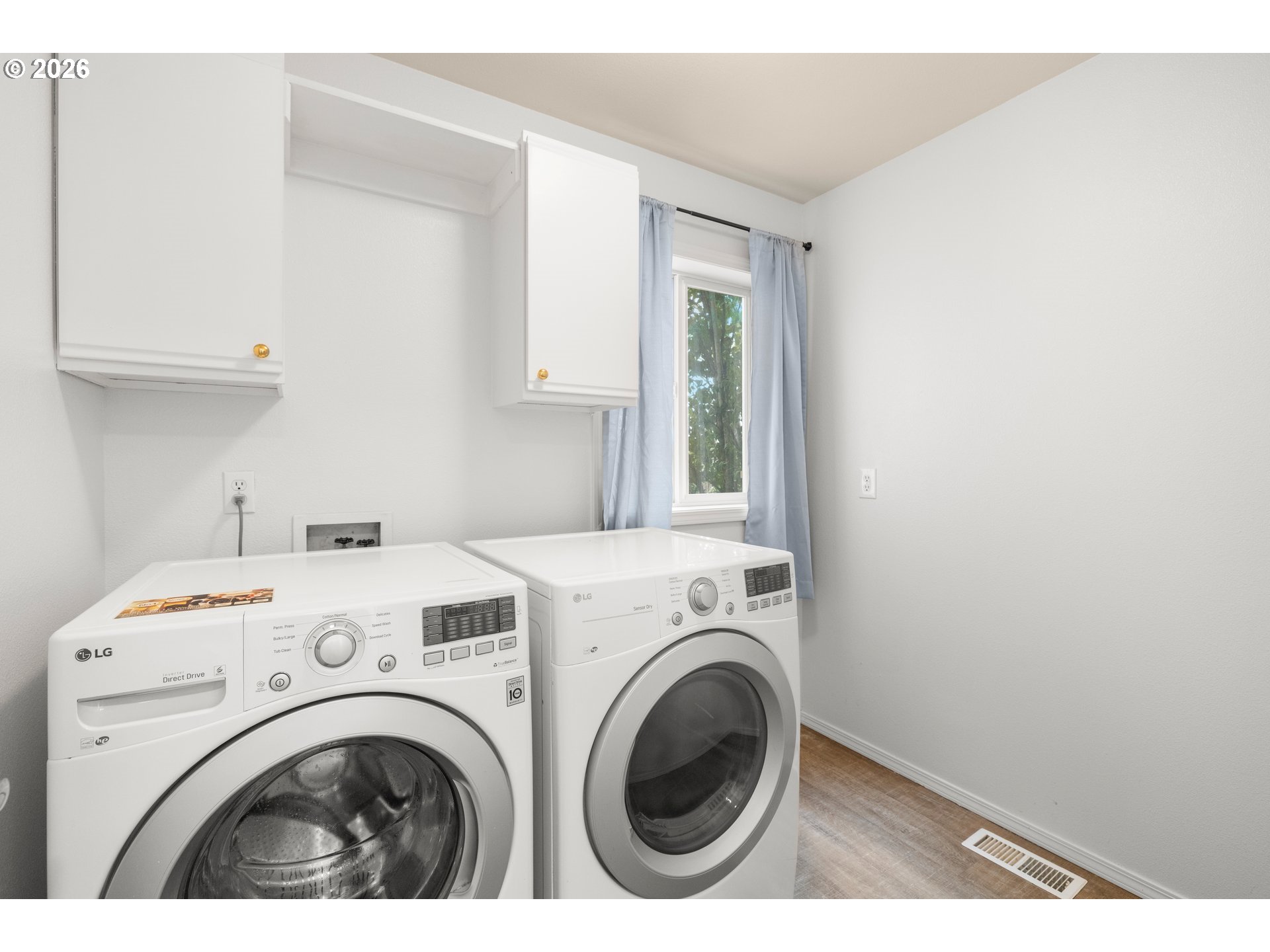 5572 Northwest 165th Place Portland, OR 97229 - Photo 21 of 48 a utility room with dryer and washer