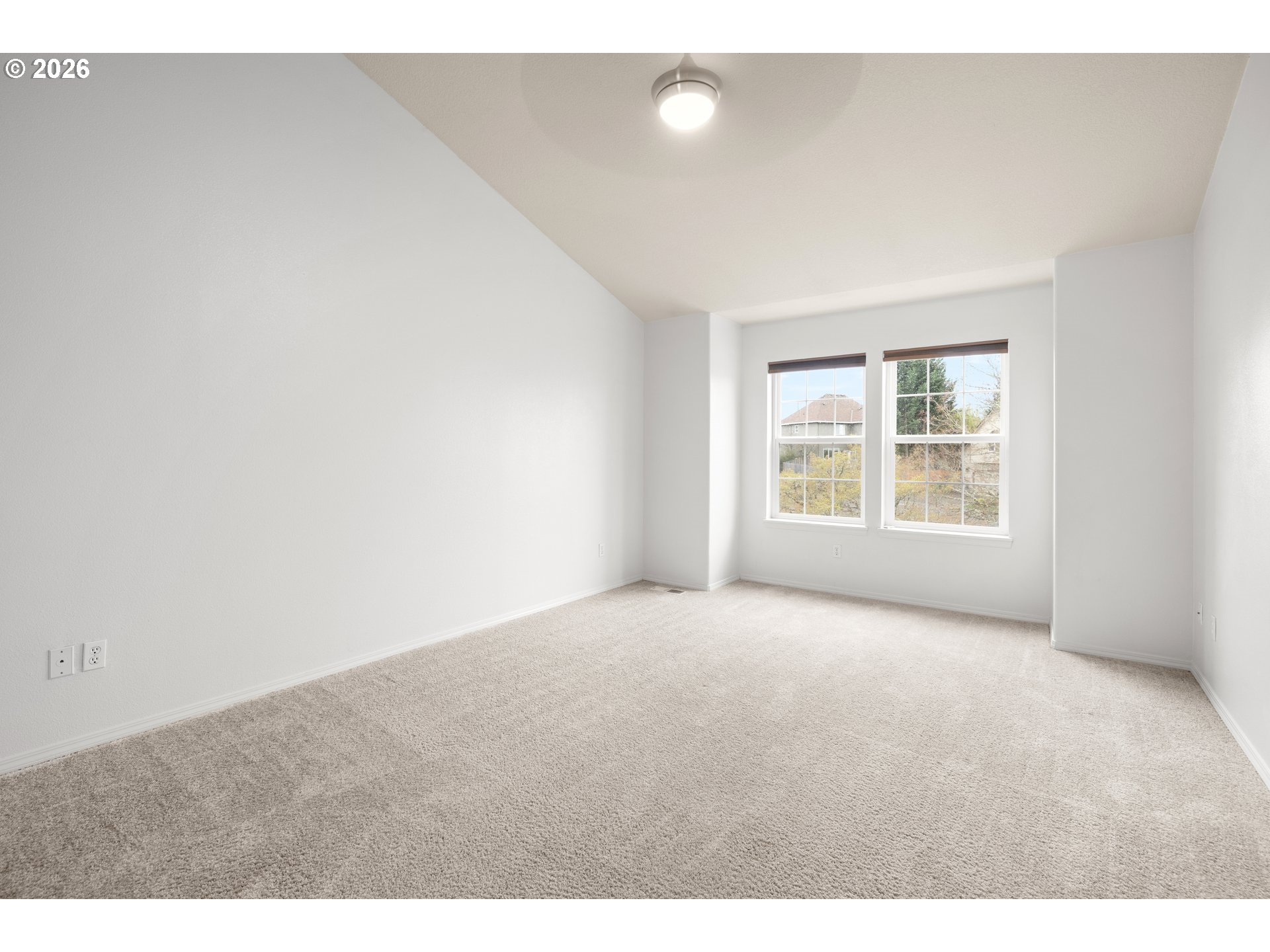 5572 Northwest 165th Place Portland, OR 97229 - Photo 22 of 48 a view of an empty room with a window