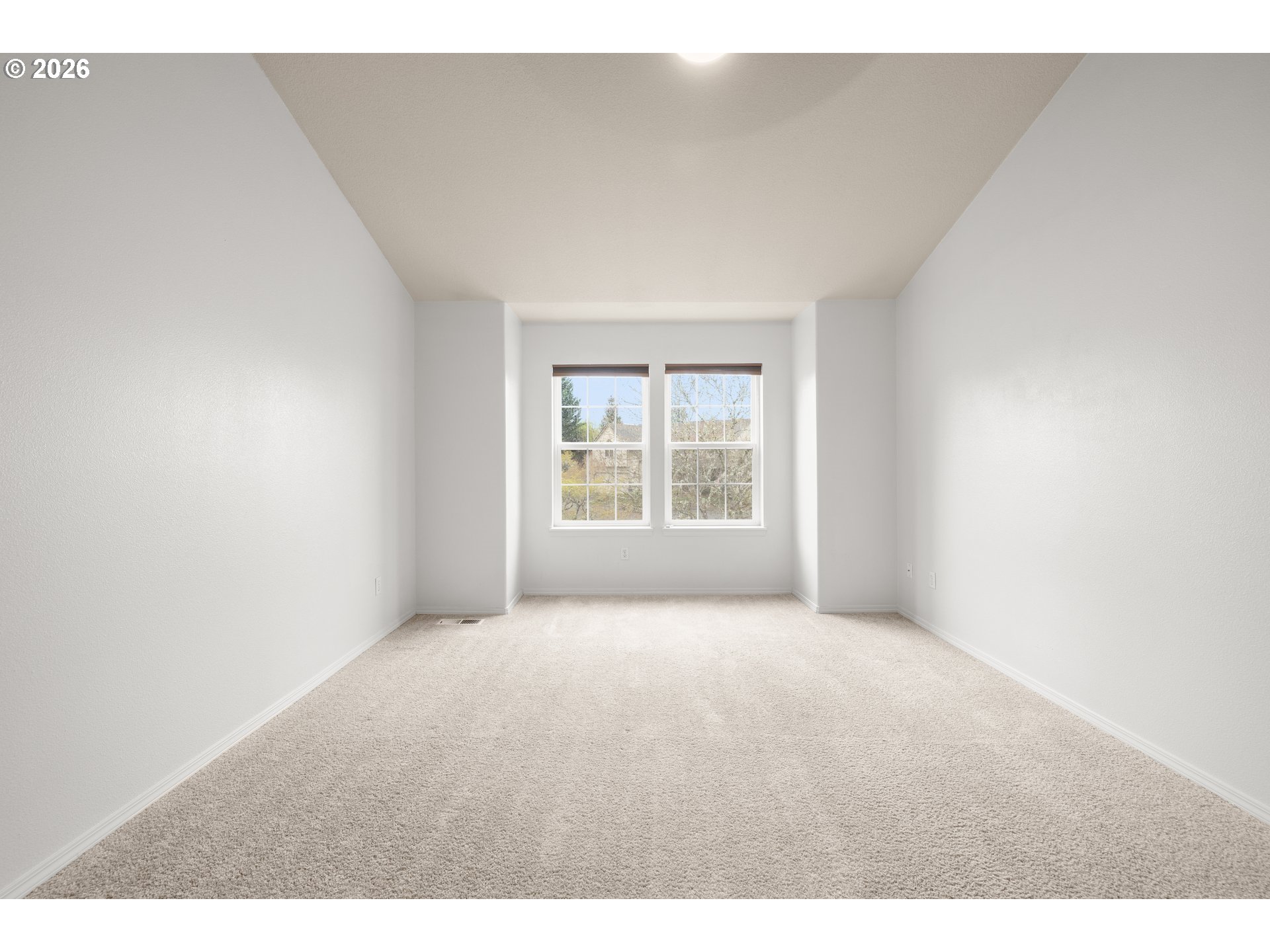 5572 Northwest 165th Place Portland, OR 97229 - Photo 23 of 48 a view of an empty room with a window