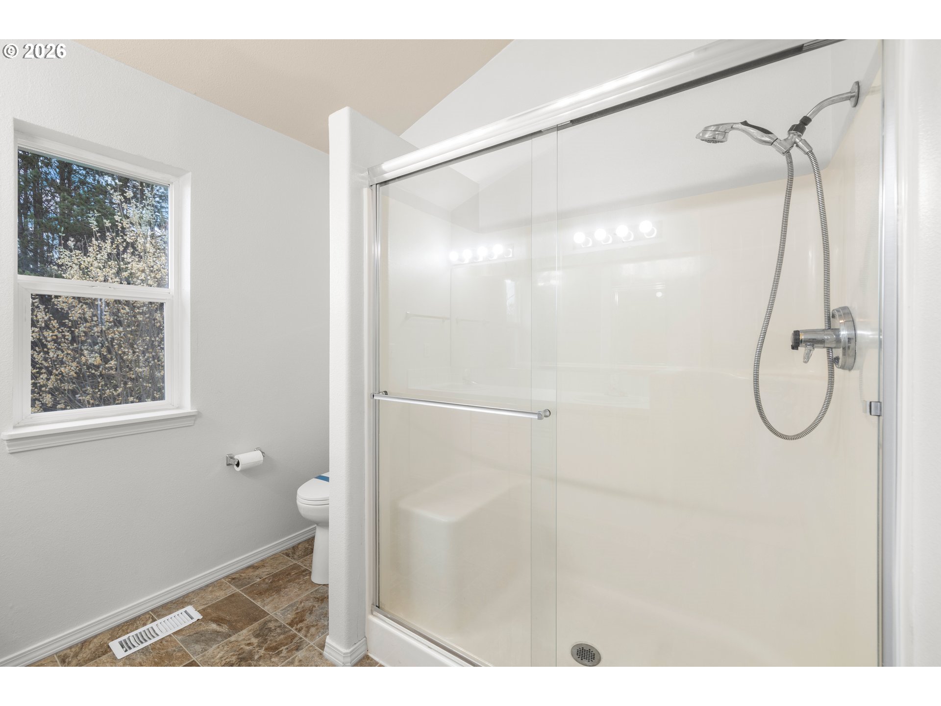 5572 Northwest 165th Place Portland, OR 97229 - Photo 25 of 48 a bathroom with a shower