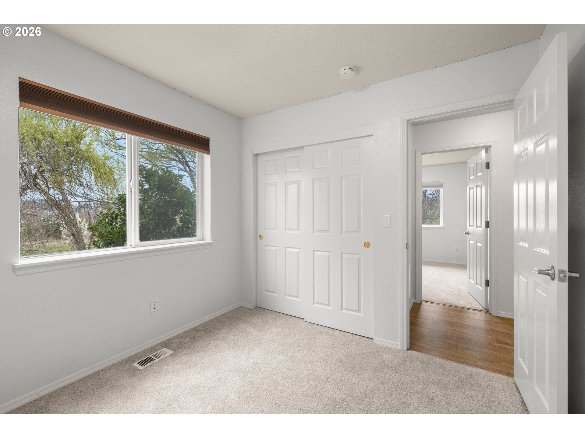5572 Northwest 165th Place Portland, OR 97229 - Photo 34 of 48 a view of a hallway with a window