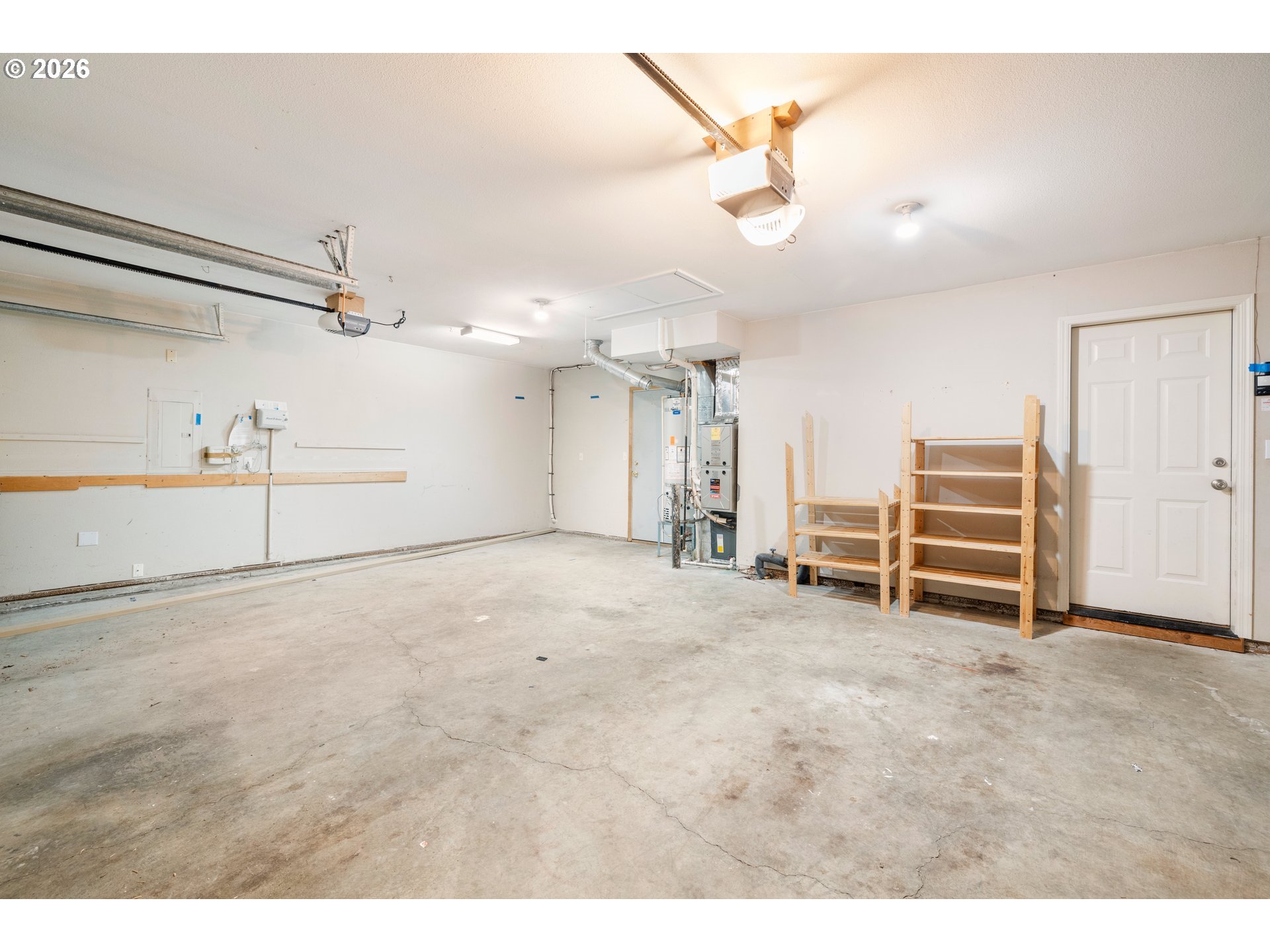 5572 Northwest 165th Place Portland, OR 97229 - Photo 35 of 48 a view of an empty room with a ceiling fan