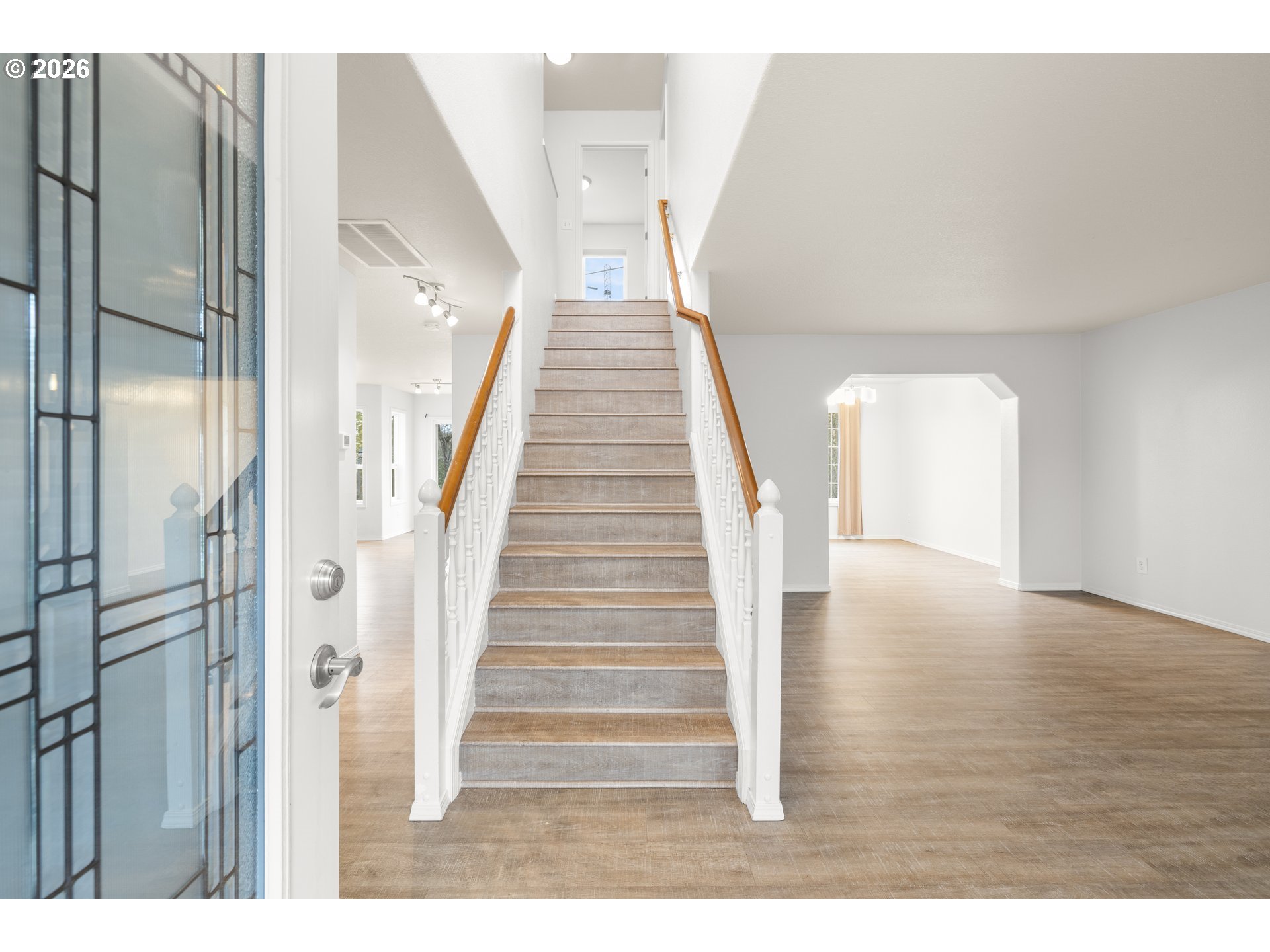 5572 Northwest 165th Place Portland, OR 97229 - Photo 4 of 48 a view of entryway and hall with wooden floor