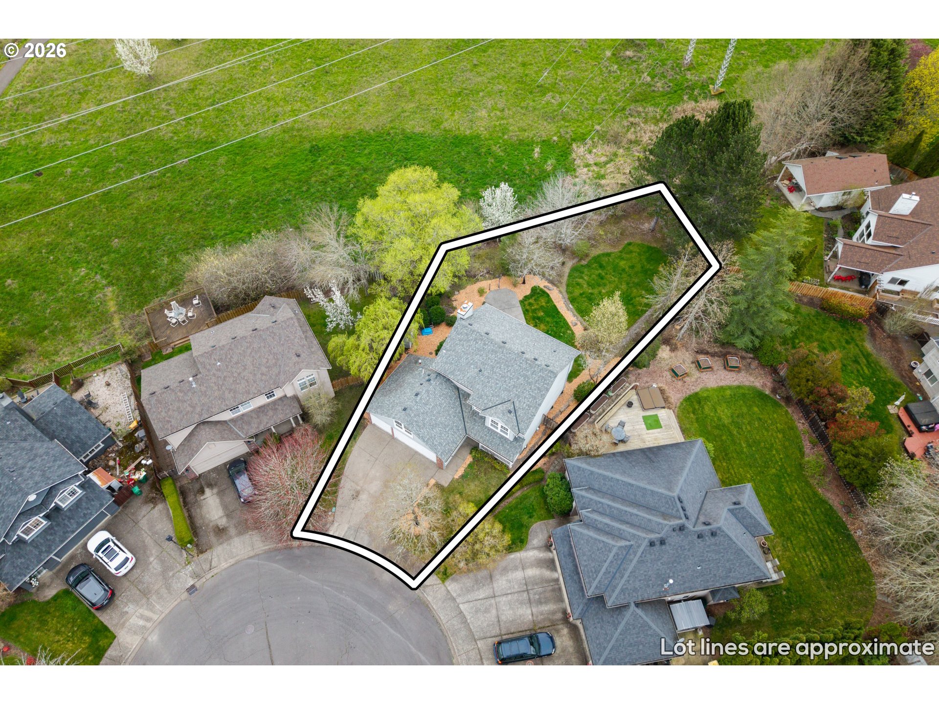 5572 Northwest 165th Place Portland, OR 97229 - Photo 42 of 48 a backyard of a house with lots of green space