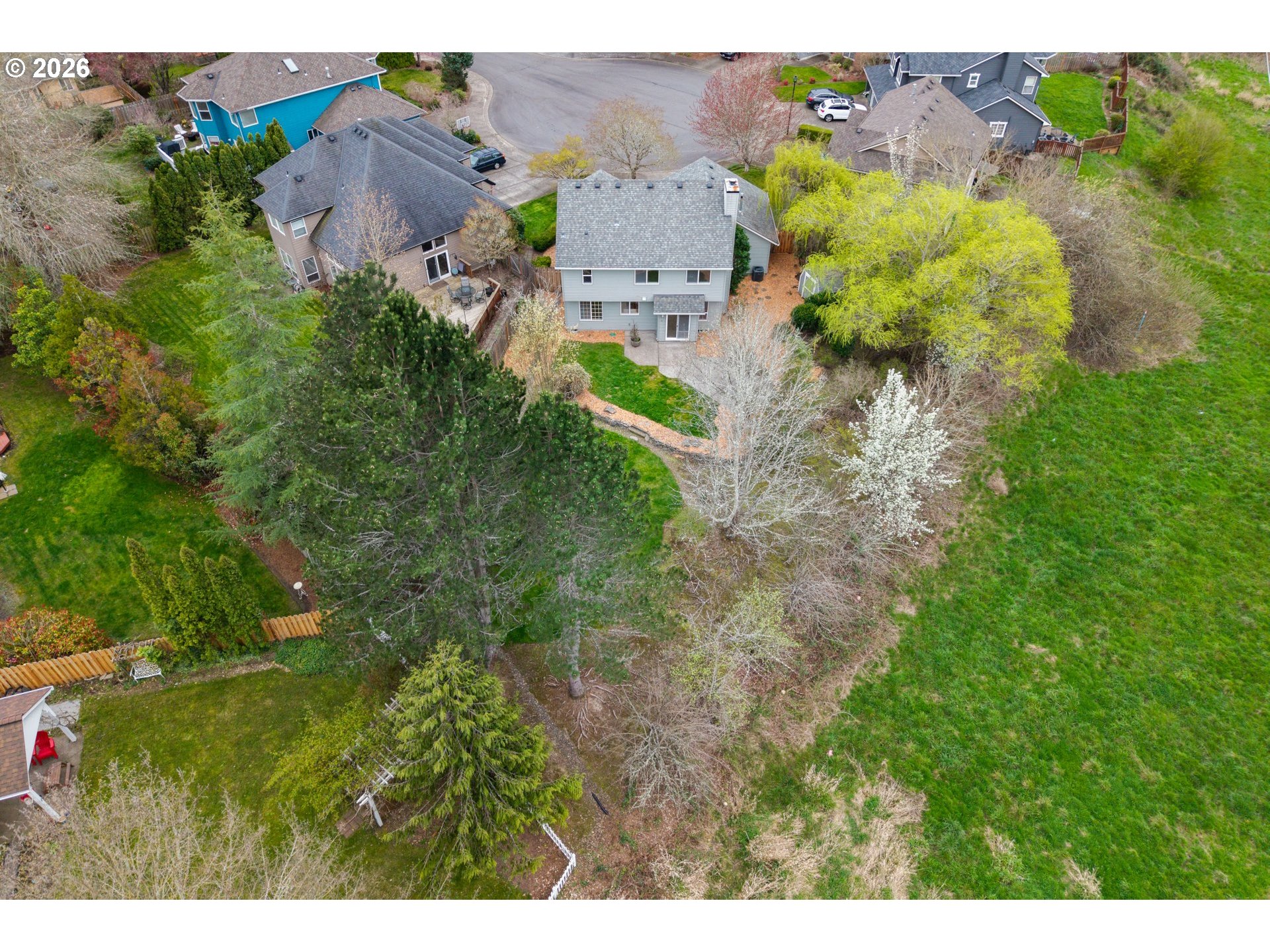 5572 Northwest 165th Place Portland, OR 97229 - Photo 44 of 48 a view of a house with a yard