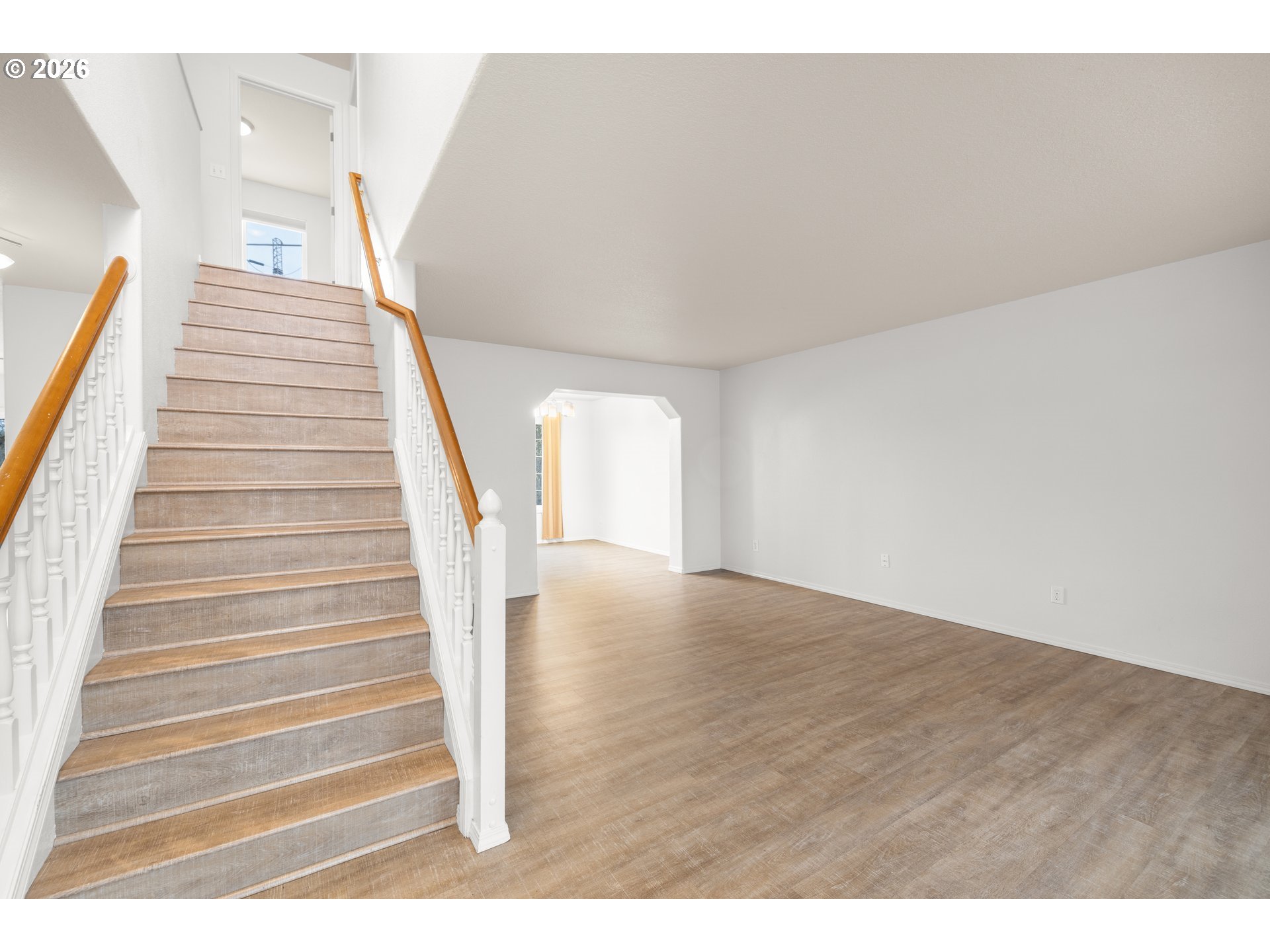 5572 Northwest 165th Place Portland, OR 97229 - Photo 5 of 48 a view of entryway and hall with wooden floor
