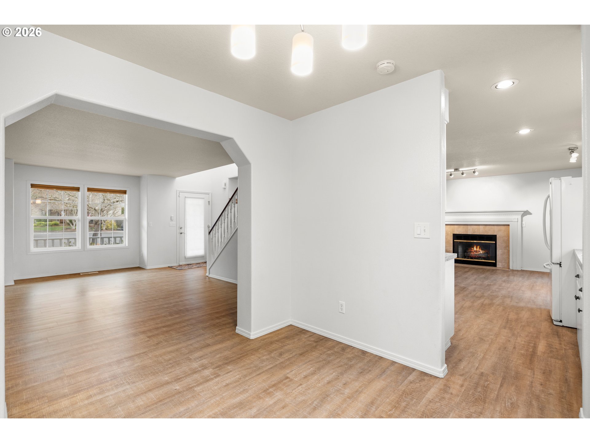5572 Northwest 165th Place Portland, OR 97229 - Photo 10 of 48 a view interior of a house and an entryway with wooden floor