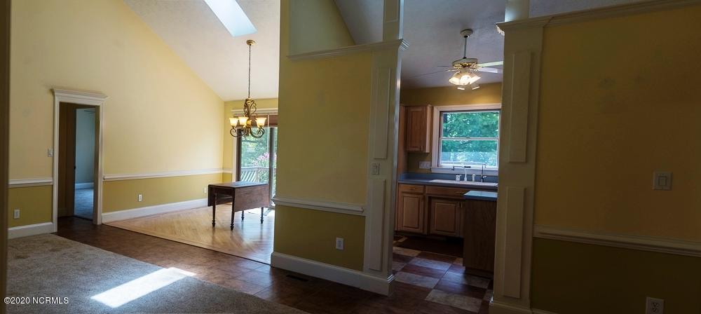 135 Pirates Road New Bern, NC 28562 - Photo 12 of 34 Living Room to Kitchen and Dining Room