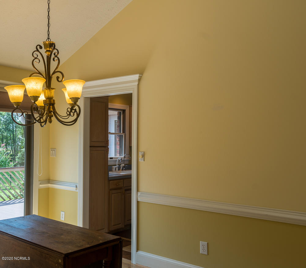 135 Pirates Road New Bern, NC 28562 - Photo 14 of 34 To Kitchen and Deck