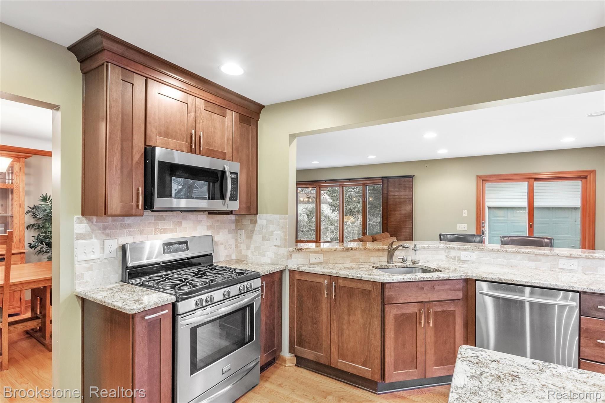 102 Maplefield Road Pleasant Ridge, MI 48069 - Photo 8 of 41 High-end gas range and dishwasher