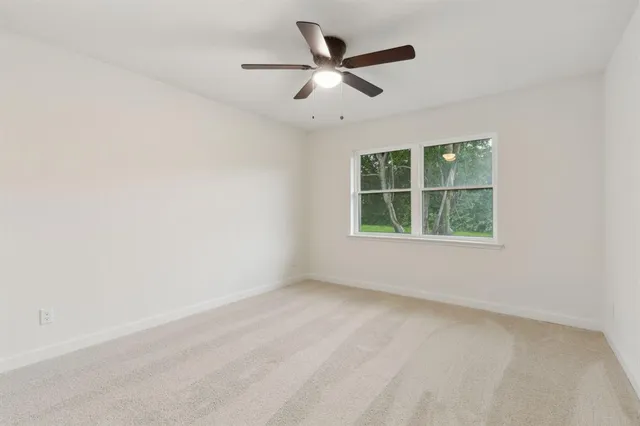 an empty room with window