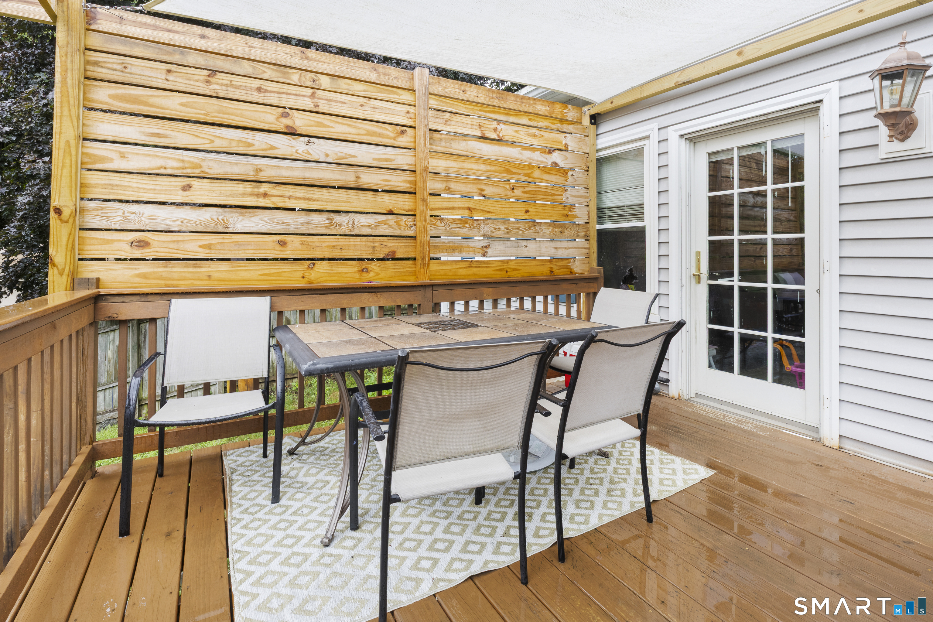 47 Broad Street Killingly, CT 06239 - Photo 29 of 33 a balcony with table and chairs