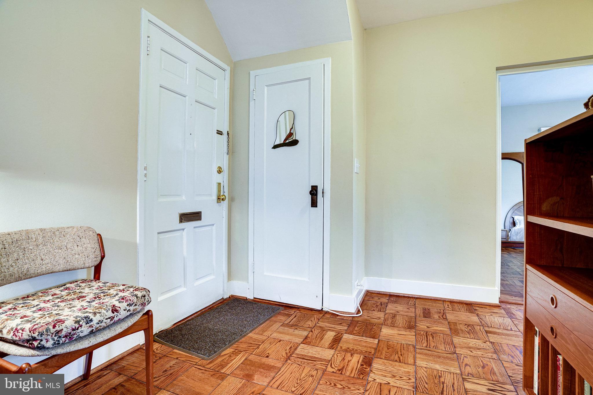 3312 Gunston Road Alexandria, VA 22302 - Photo 11 of 43 5ft deep coat closet off entryway.