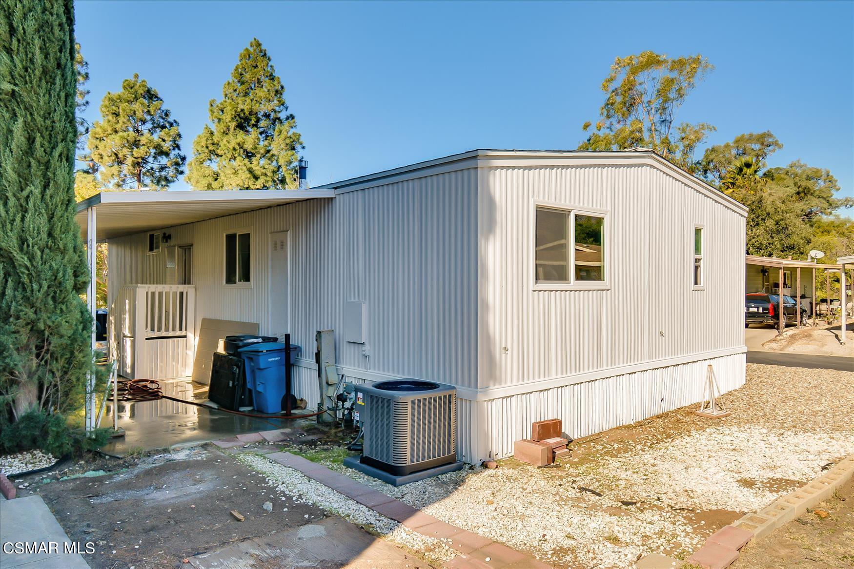 6480 Katherine Road, Unit 21 Simi Valley, CA 93063 - Photo 2 of 42 a front view of a house