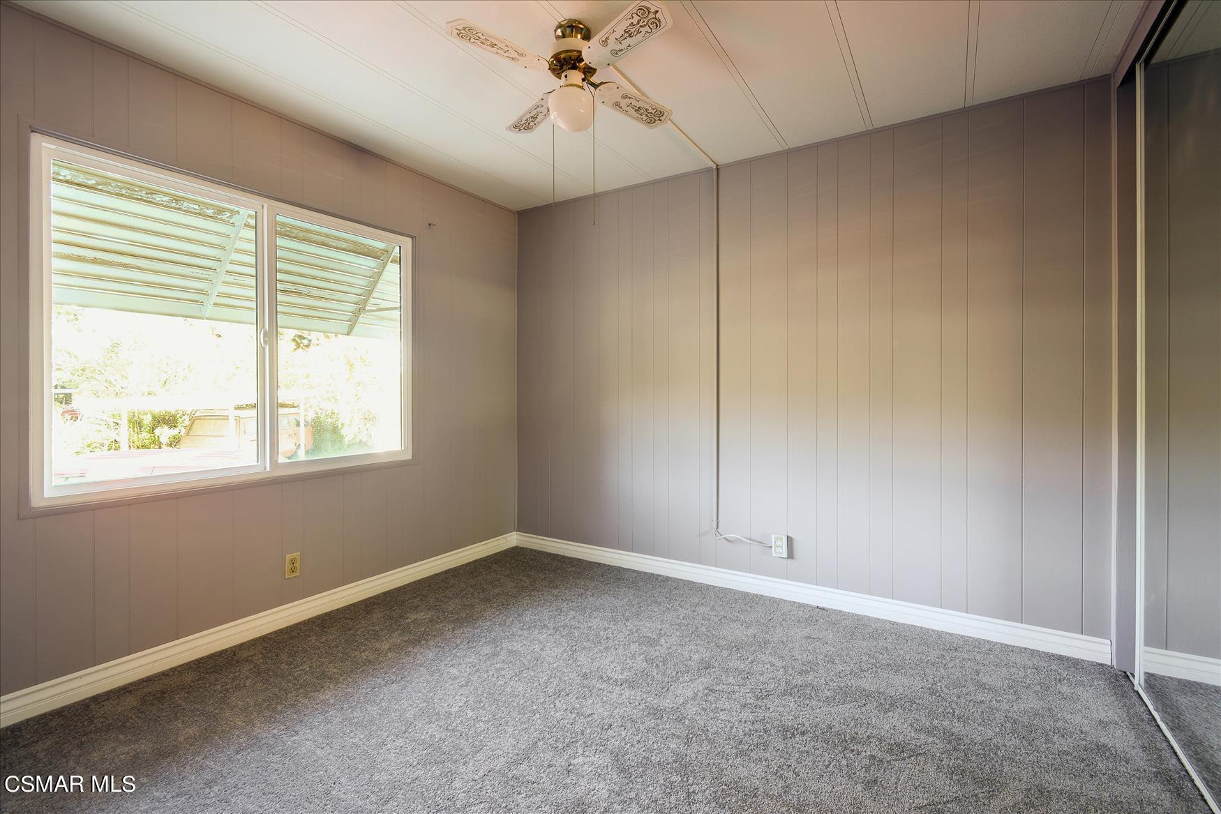 6480 Katherine Road, Unit 21 Simi Valley, CA 93063 - Photo 12 of 42 a view of an empty room with a window