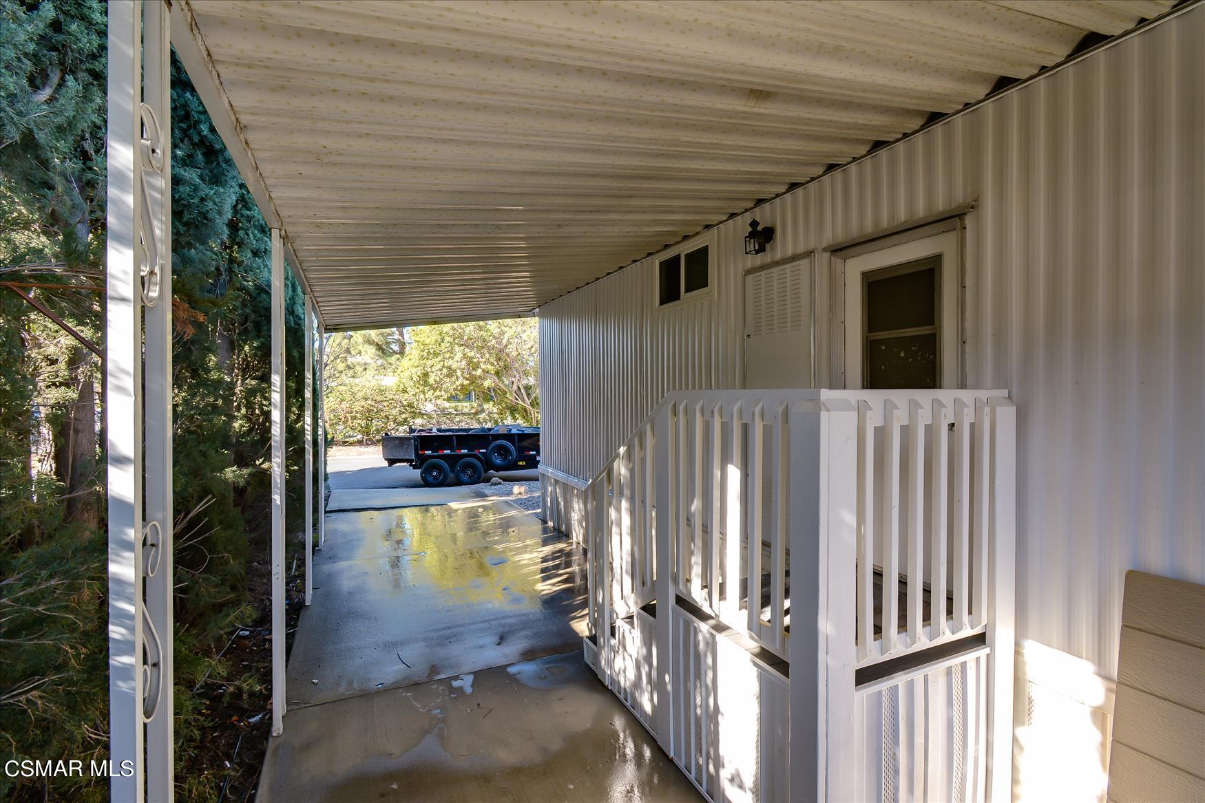 6480 Katherine Road, Unit 21 Simi Valley, CA 93063 - Photo 4 of 42 a view of a porch