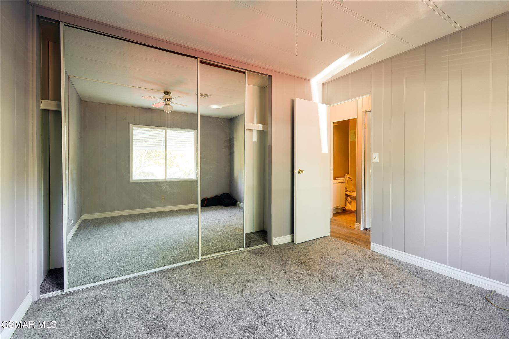 6480 Katherine Road, Unit 21 Simi Valley, CA 93063 - Photo 32 of 42 an empty room & a bathroom