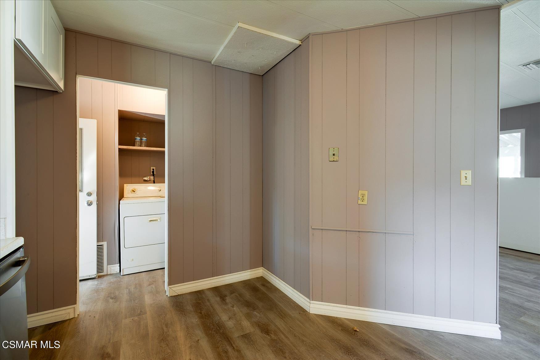 6480 Katherine Road, Unit 21 Simi Valley, CA 93063 - Photo 36 of 42 an empty room with wooden floor and entrance