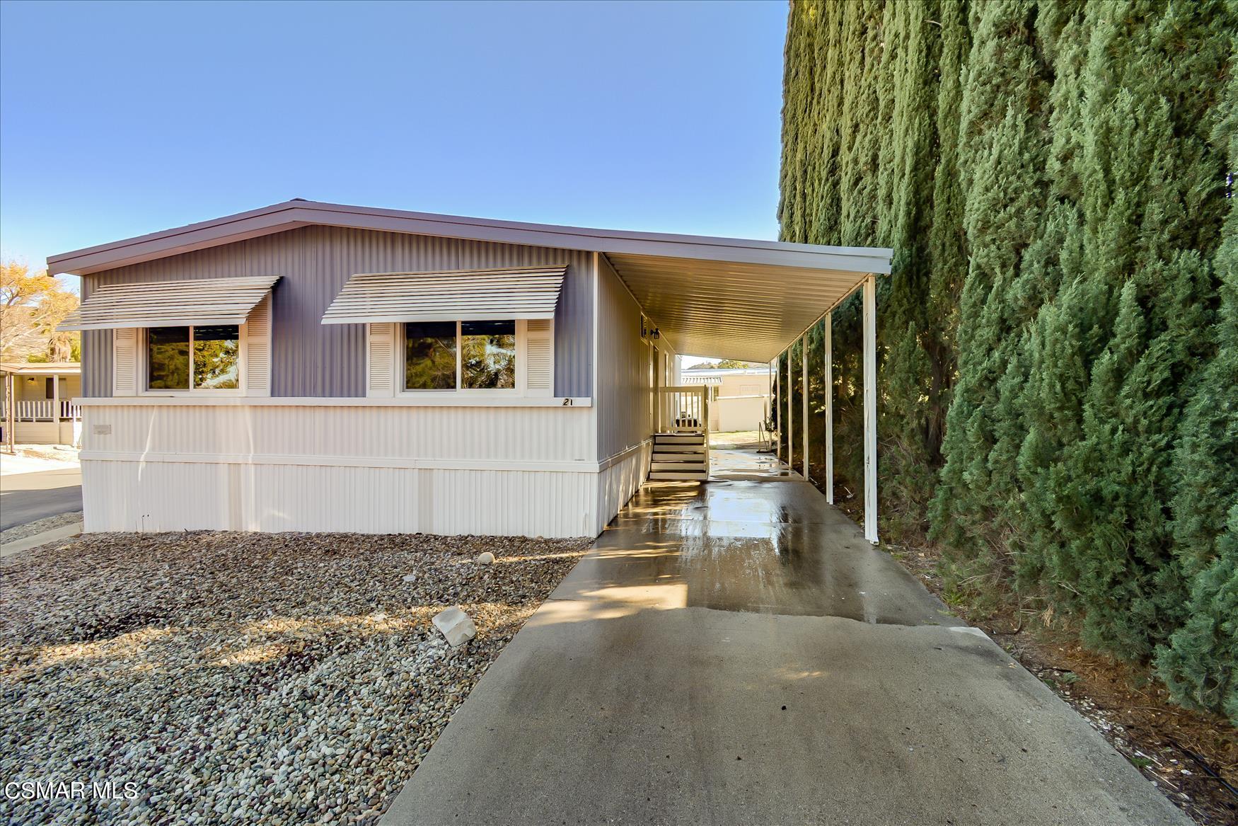6480 Katherine Road, Unit 21 Simi Valley, CA 93063 - Photo 41 of 42 a view of a house with backyard