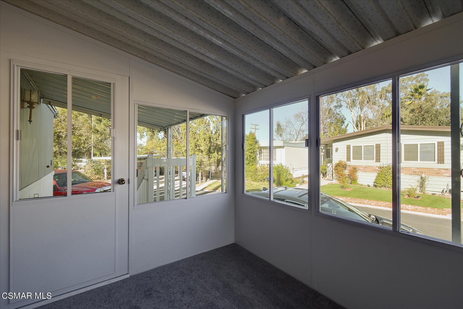 6480 Katherine Road, Unit 21 Simi Valley, CA 93063 - Photo 9 of 42 a view of an empty room with a window