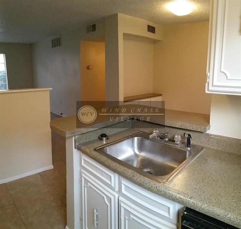 2400 Buffalo Gap Road, Unit 260 Abilene, TX 79605 - Photo 6 of 8 a bathroom with a sink and a mirror