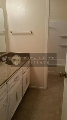 a utility room with washer and dryer