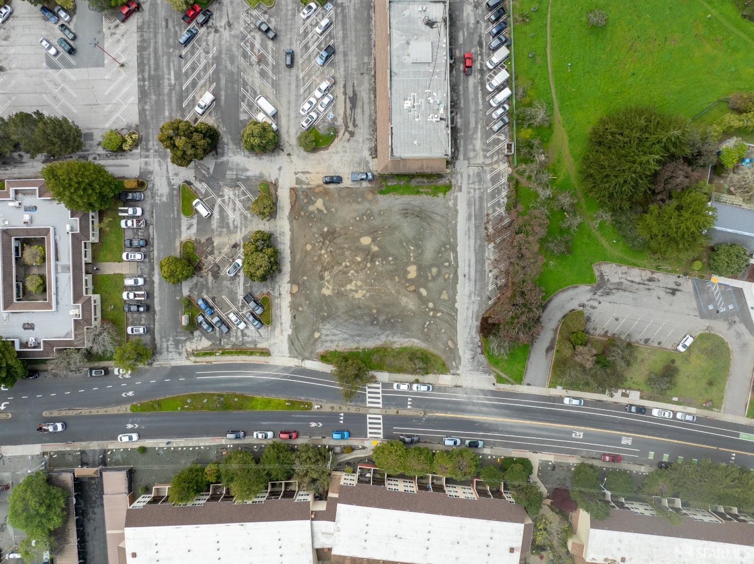 1055 Terra Nova Boulevard Pacifica, CA 94044 - Photo 11 of 13 a front view of a house with a yard