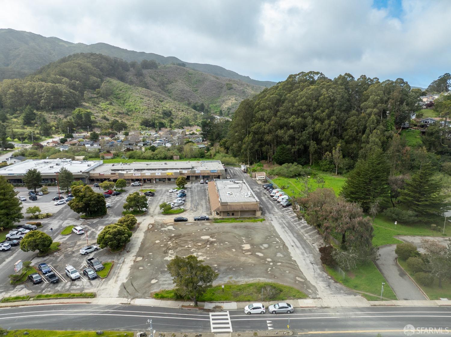 1055 Terra Nova Boulevard Pacifica, CA 94044 - Photo 2 of 13 an aerial view of a house with yard