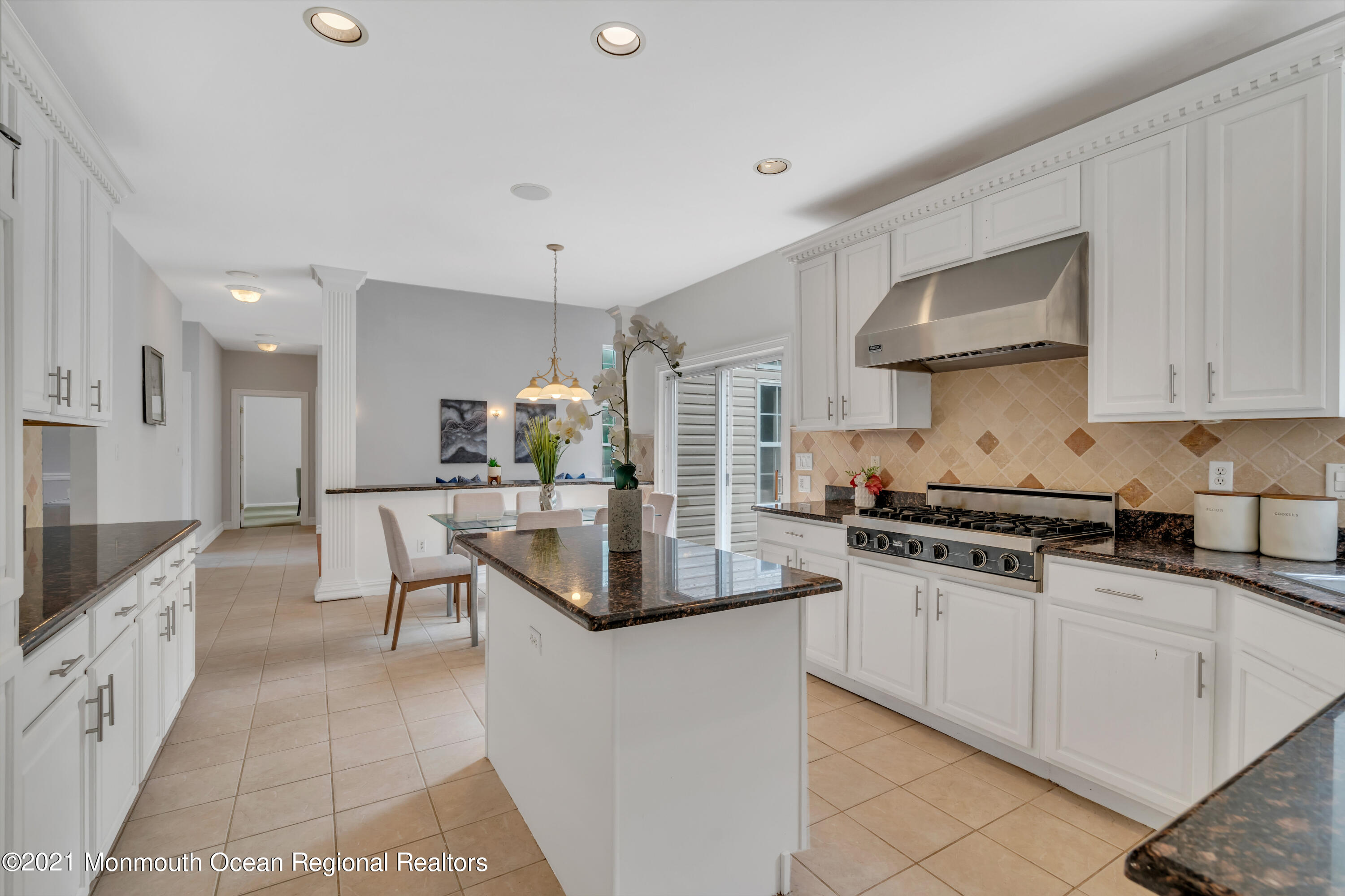 20 Highland Drive Jackson, NJ 08527 - Photo 19 of 62 a kitchen with stainless steel appliances granite countertop a sink stove and refrigerator