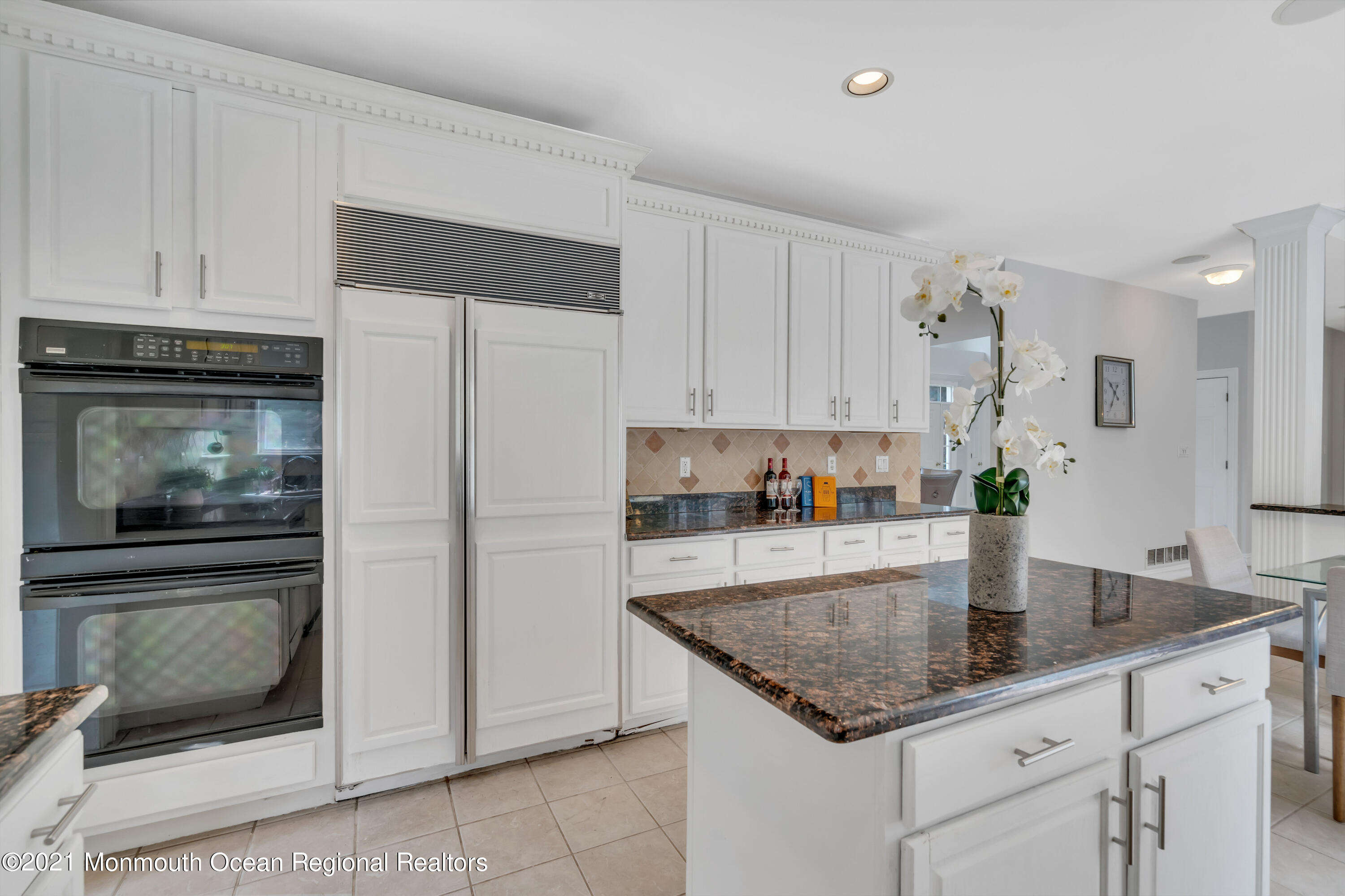 20 Highland Drive Jackson, NJ 08527 - Photo 20 of 62 a kitchen with granite countertop a sink stainless steel appliances and white cabinets