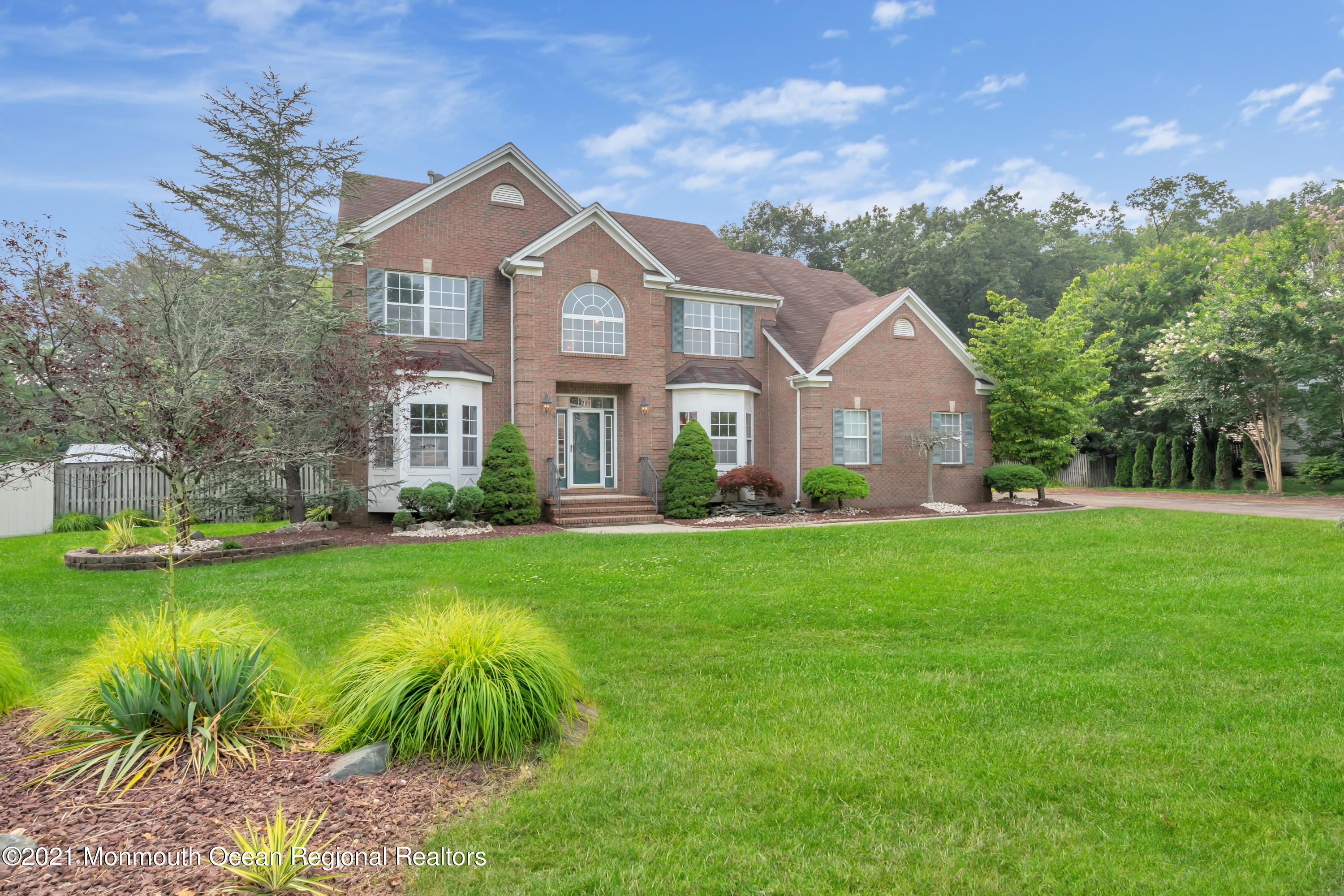 20 Highland Drive Jackson, NJ 08527 - Photo 3 of 62 a front view of a house with a yard