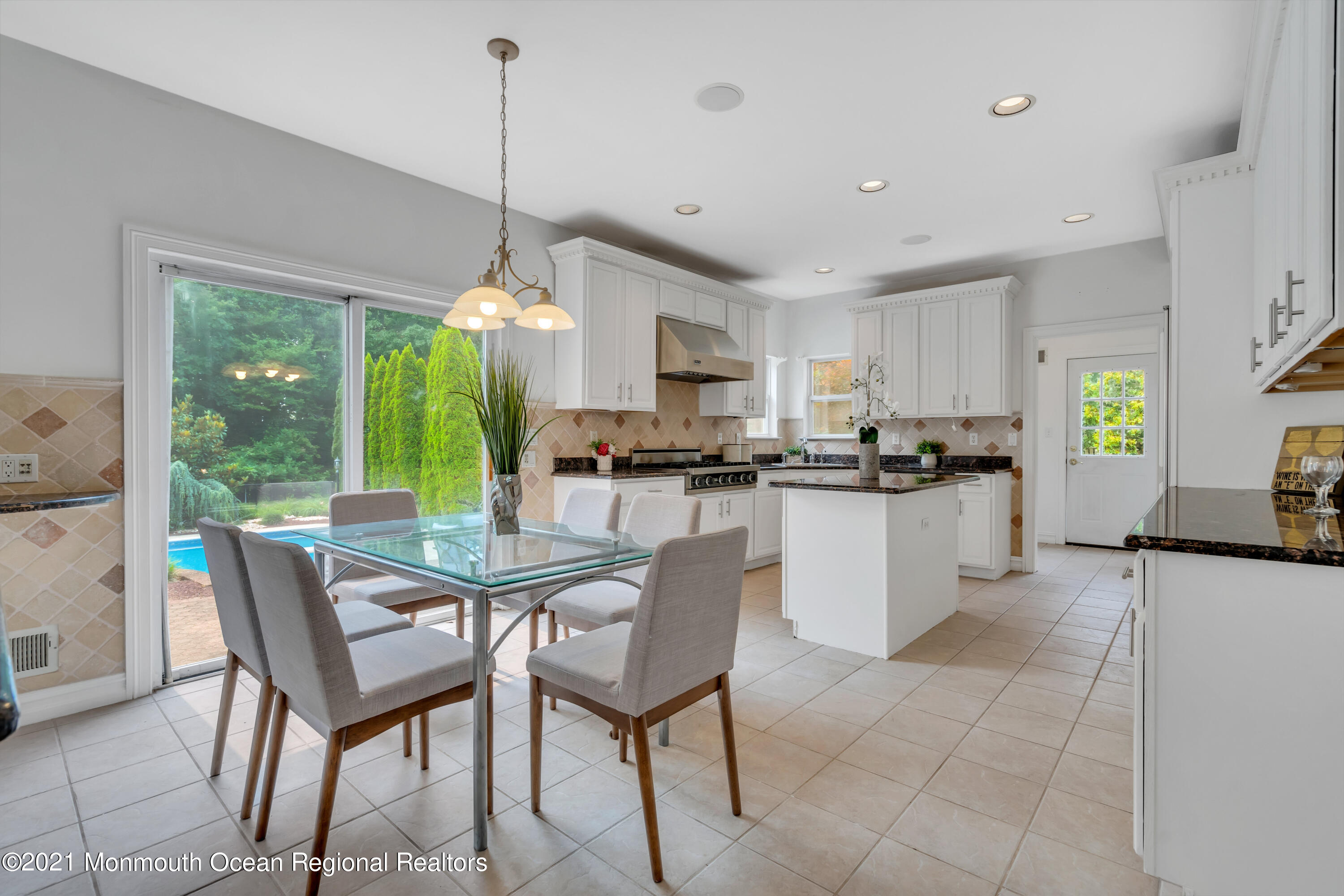 20 Highland Drive Jackson, NJ 08527 - Photo 22 of 62 a dining room filled kitchen with a table and chairs