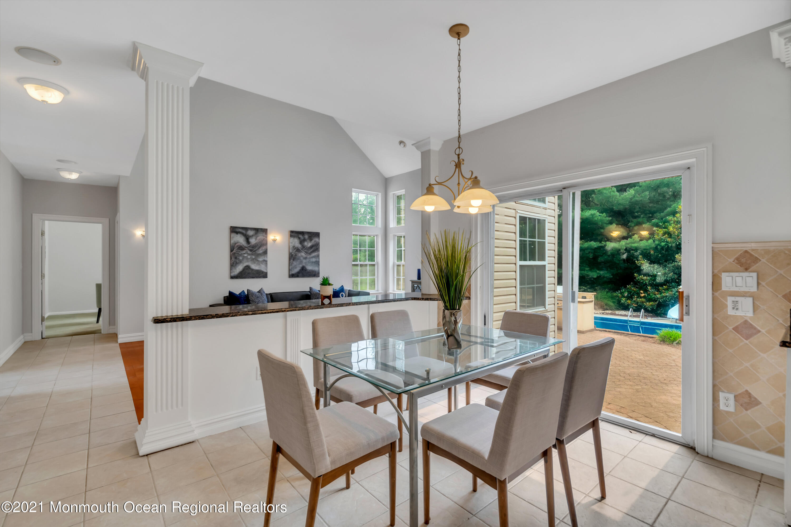 20 Highland Drive Jackson, NJ 08527 - Photo 23 of 62 a dining room with furniture a chandelier and wooden floor