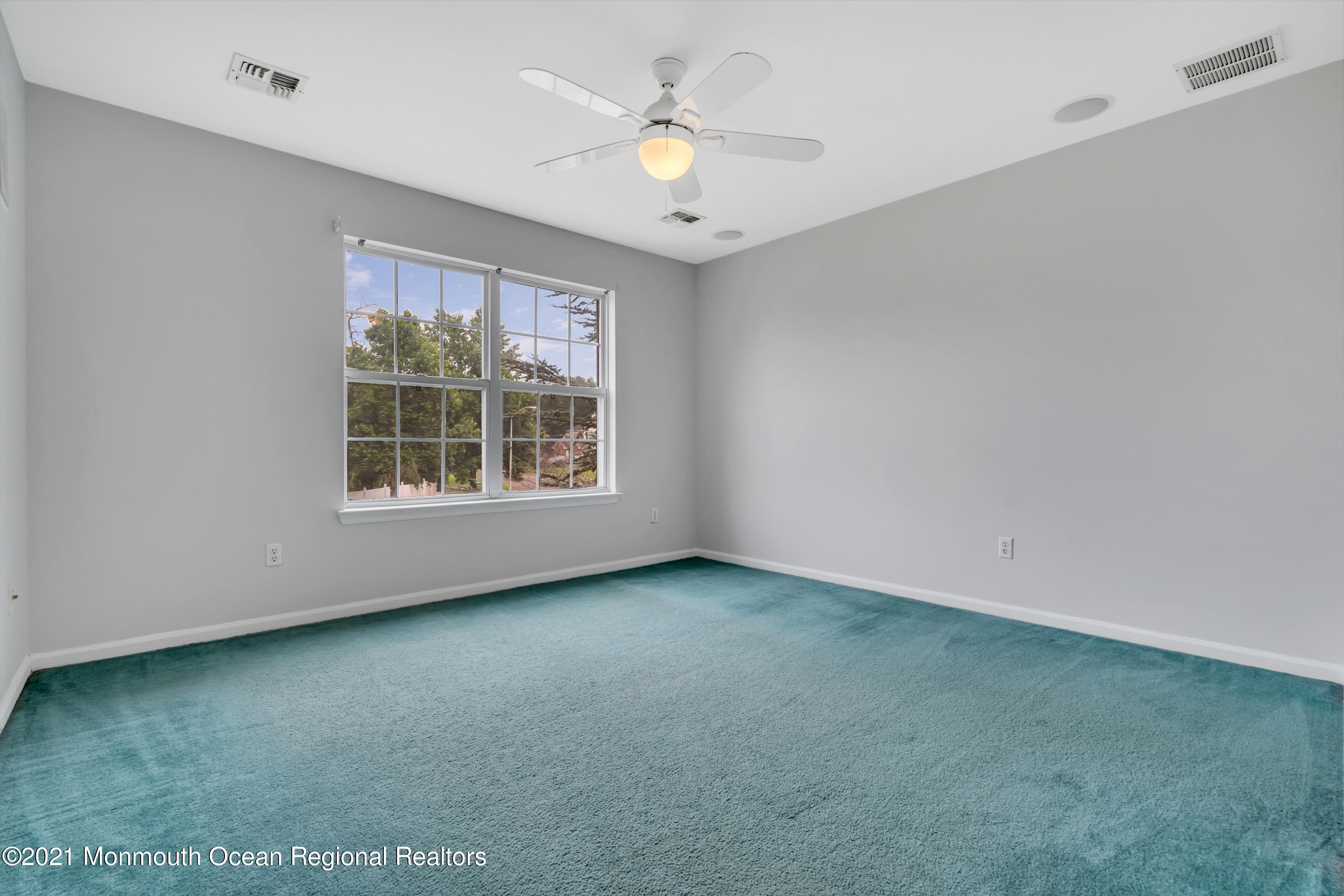 20 Highland Drive Jackson, NJ 08527 - Photo 32 of 62 an empty room with windows and fan
