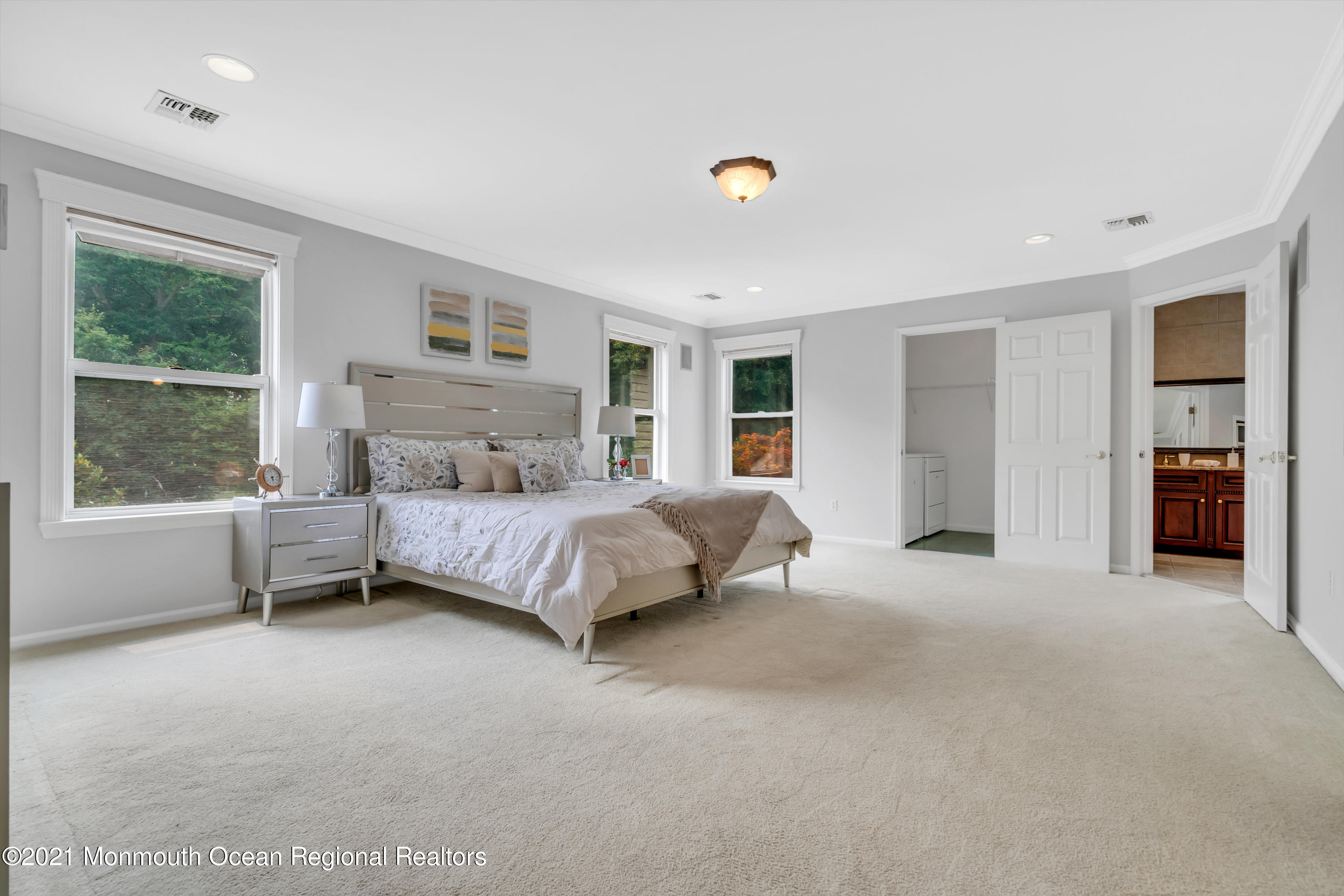 20 Highland Drive Jackson, NJ 08527 - Photo 34 of 62 a bedroom with a large bed and a window