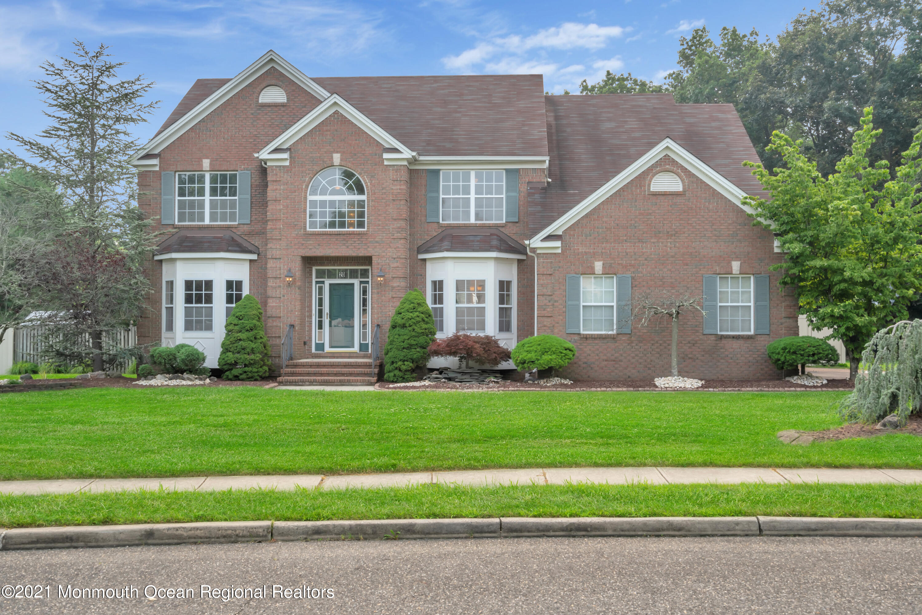 20 Highland Drive Jackson, NJ 08527 - Photo 5 of 62 a front view of a house with a yard