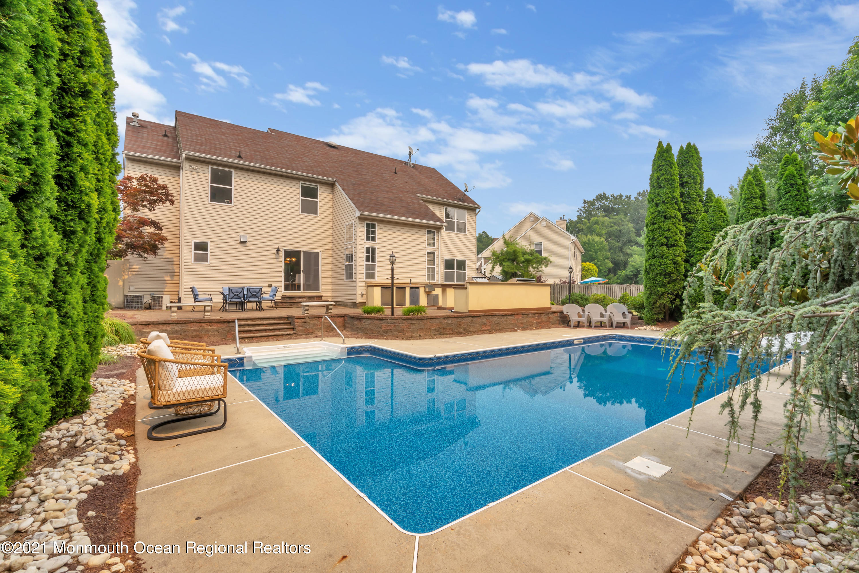 20 Highland Drive Jackson, NJ 08527 - Photo 52 of 62 a view of a swimming pool with lounge chair