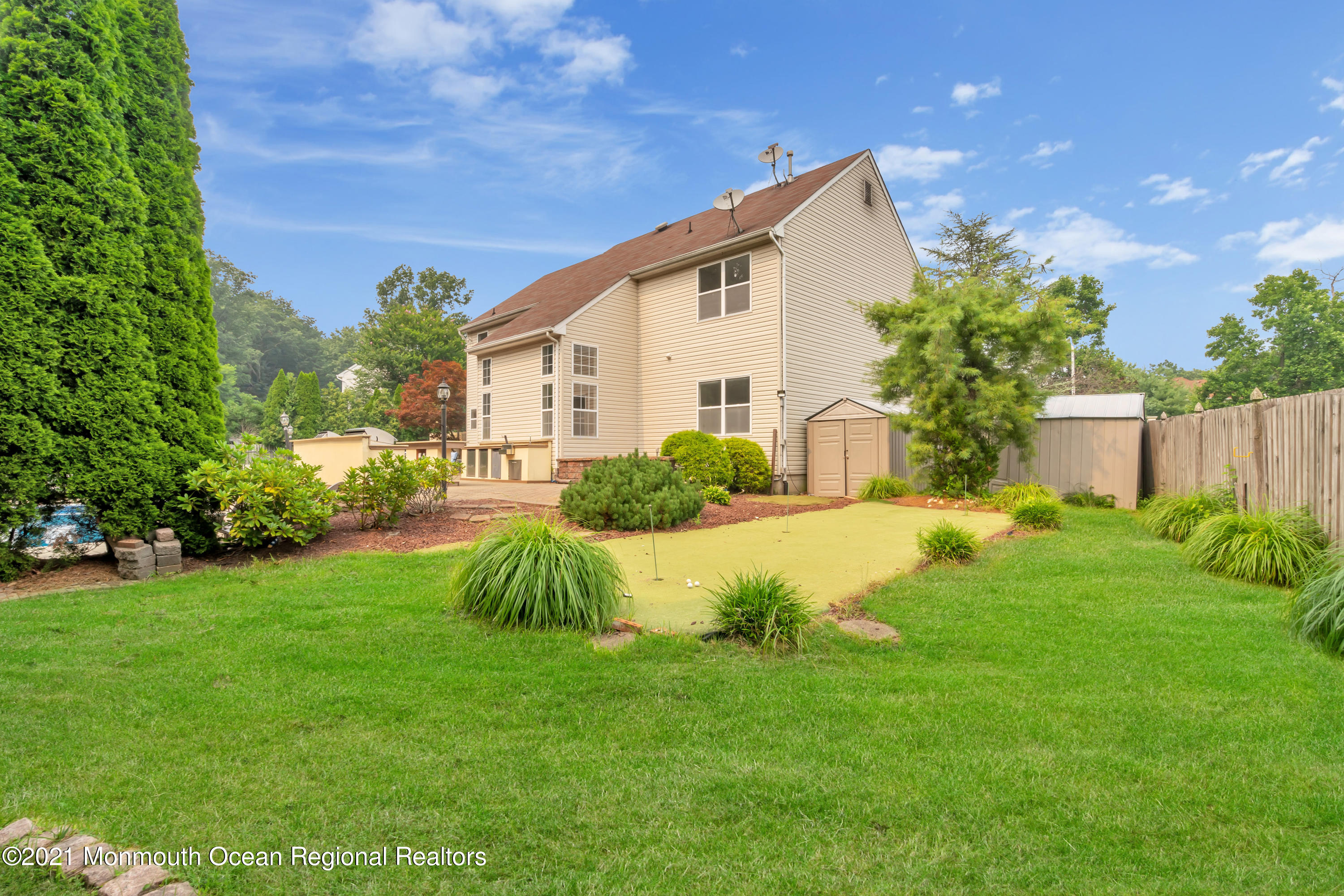 20 Highland Drive Jackson, NJ 08527 - Photo 55 of 62 a front view of house with a garden