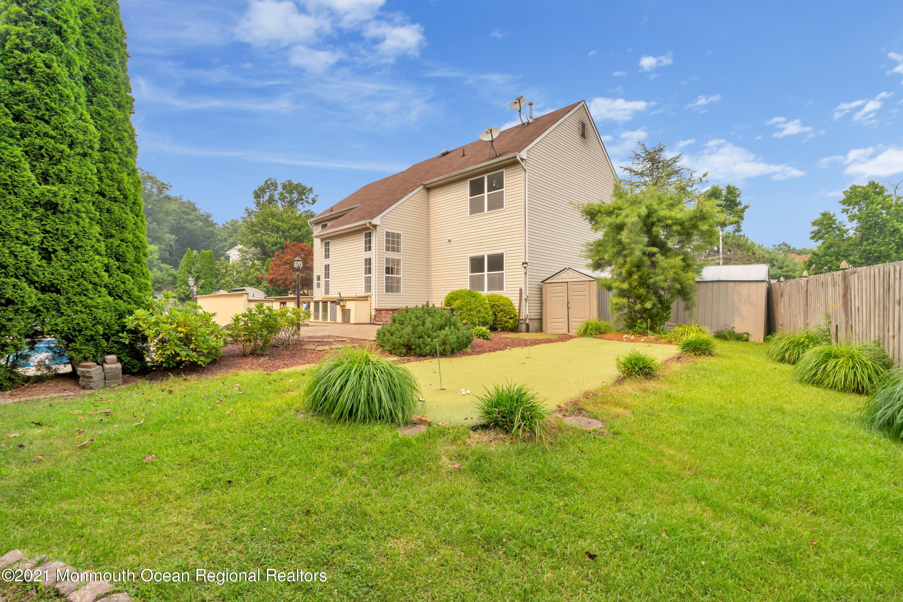 20 Highland Drive Jackson, NJ 08527 - Photo 61 of 62 a front view of house with yard and green space