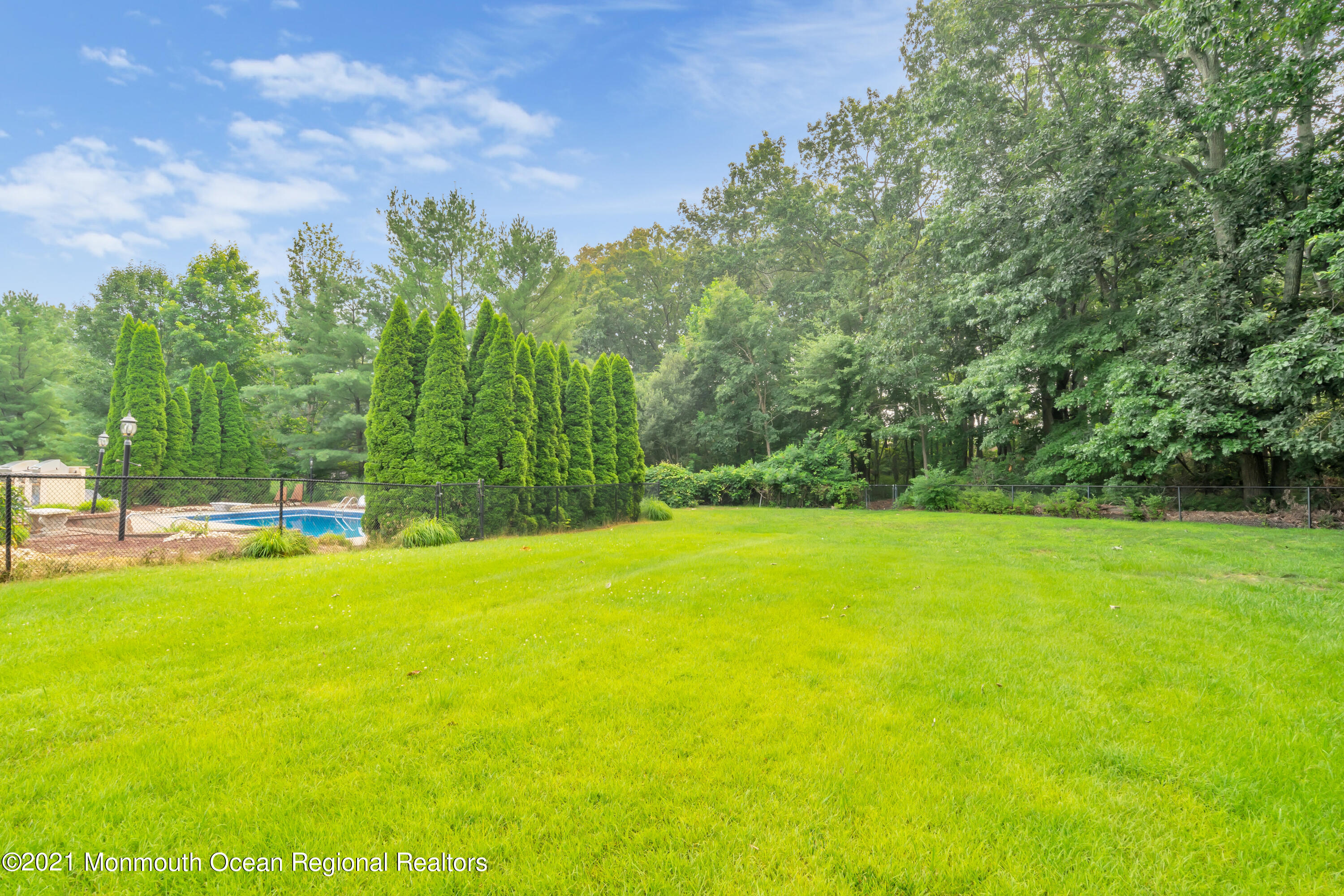 20 Highland Drive Jackson, NJ 08527 - Photo 62 of 62 a view of a big yard with a large trees